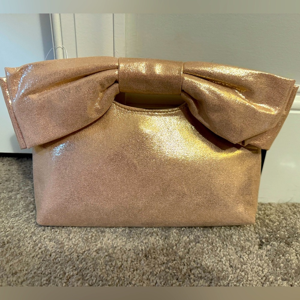 Cute IMO pink metallic bow handle clutch crossbody purse handbag